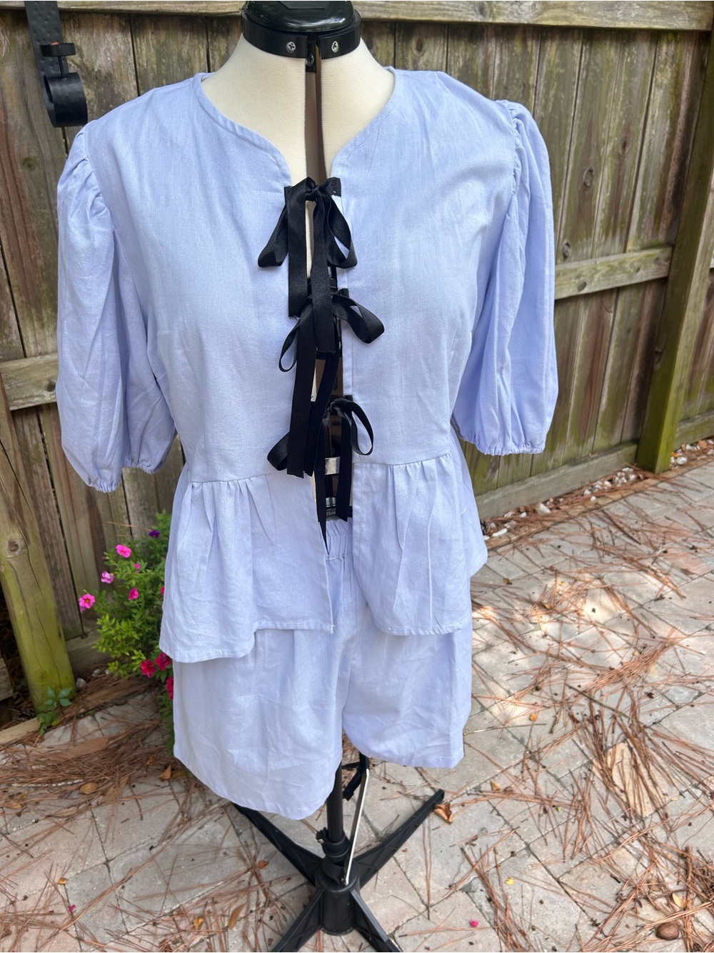 Shorts and blouse light blue set .